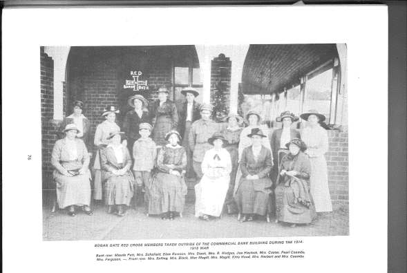 Members of the Bogan Gate Red Cross taken outside of the Commercial Bank building during the 1914-1918 War. Back Row: Maude Pett, Mrs Schofield, Elsie Rowson, Mrs Stack, Mrs R Hodges, Joe Haylock, Mrs Coster, Pearl Coombs, Mrs Ferguson, unknown. Front Row: Mrs Solling, Mrs Black, Mac Magill, Mrs Mrs Magill, Kitty Hood, Mrs Herbert and Mrs Coombs